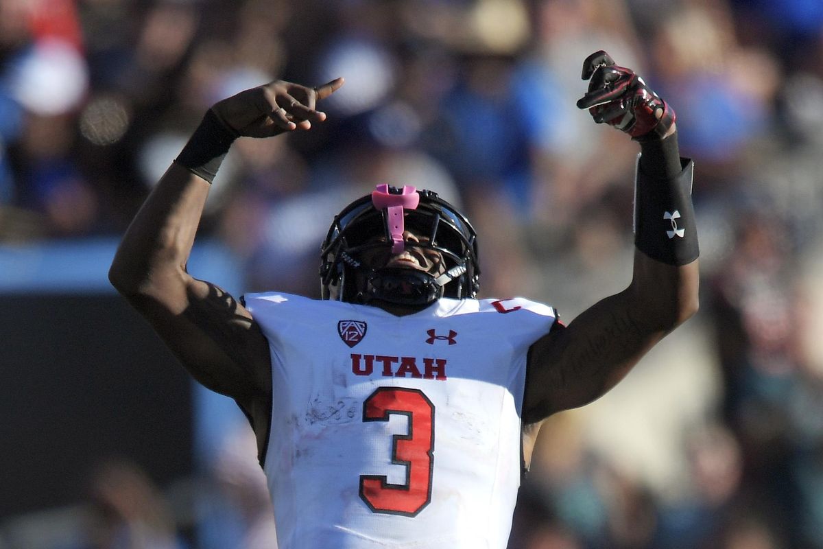 Utah quarterback Troy Williams, celebrating a touchdown against UCLA in a victory last Saturday, started out his college career at the University of Washington. (Mark J. Terrill / Associated Press)