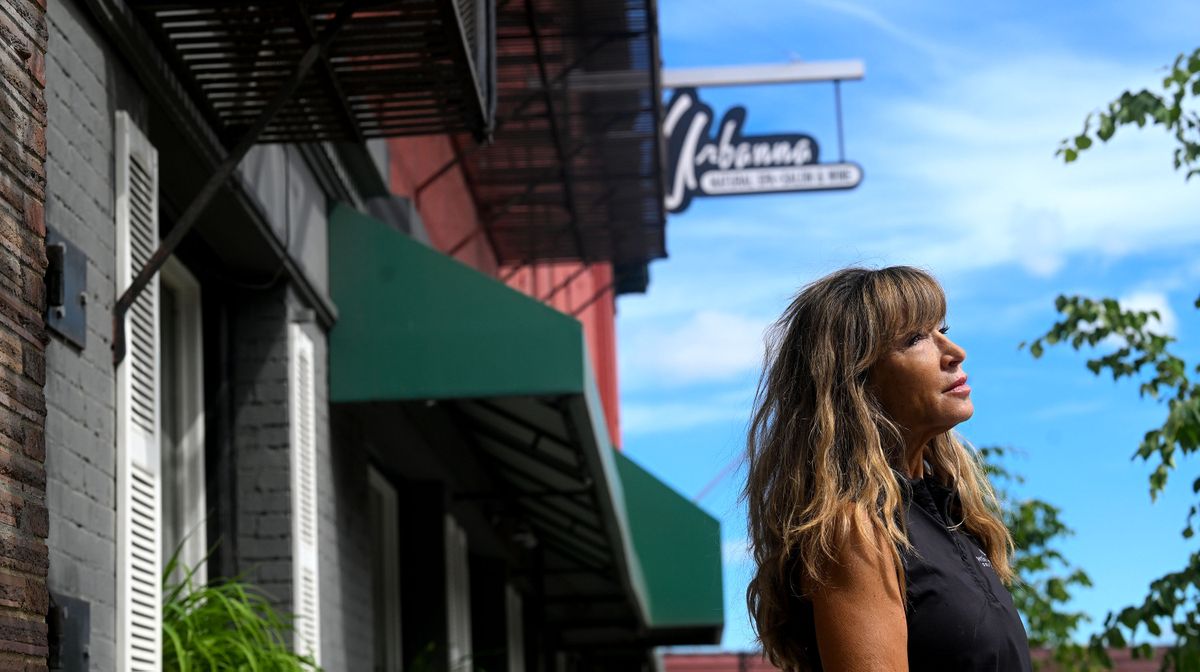 Urbanna Natural Spa Salon and Wine is closing because of the rampant crime in the area. Owner Linda Biel talks about the situation in front of her shop Tuesday in Spokane.  (Kathy Plonka/The Spokesman-Revie)