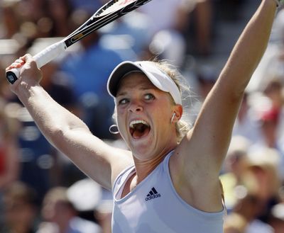 Melanie Oudin celebrates her victory over Elena Dementieva. (Associated Press / The Spokesman-Review)