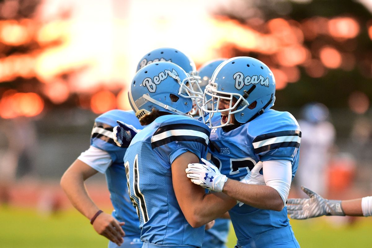 Central Valley’s Gage Connole, right, celebrates after scoring a touchdown. (Tyler Tjomsland)