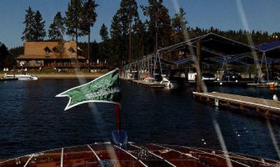 
Prospective buyers are treated to a boat ride recentlly to Gozzer Ranch. 
 (The Spokesman-Review)