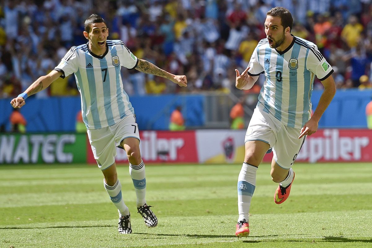 Argentina forward Gonzalo Higuain, right, celebrates with Angel di Maria after scoring the opening goal. (AP)