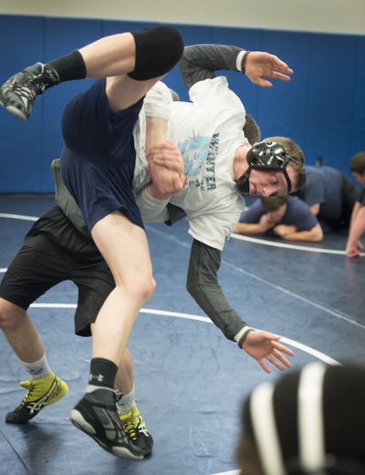 Central Valley High School senior David Shepard, practices with teammate Ben Hisel (behind) Monday. (Colin Mulvany)