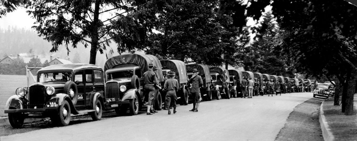 Soldiers from the Fourth Infantry, stationed at Fort Wright, in Spokane, lined up on the station grounds, in 1938, preparing to caravan to Coeur d