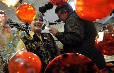 Darlene and John Johnson sell their blown glass creations at Silver Lake Mall.  (Kathy Plonka / The Spokesman-Review)