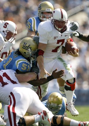 Stanford RB Toby Gerhart is known for breaking tackles.  (Associated Press / The Spokesman-Review)
