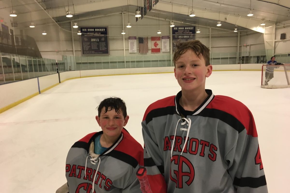 Brothers Milo Condran and Eddie Condran enjoy playing hockey.  (Courtesy of Ed Condran)