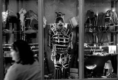 A display of Bob Fletcher's samurai costumes including swords is on display at Post Falls Library. His creations include samurai, Egyptian and Native American costumes as well as paintings.
(Kathy Plonka / The Spokesman-Review)