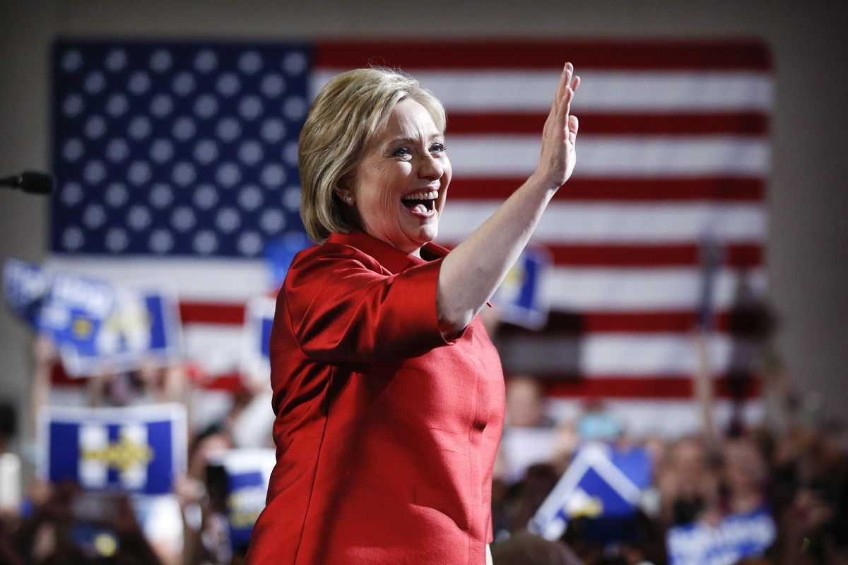 Democratic presidential candidate Hillary Clinton, waves at a Nevada Democratic caucus rally, Saturday, Feb. 20, 2016, in Las Vegas. (John Locher / Associated Press)