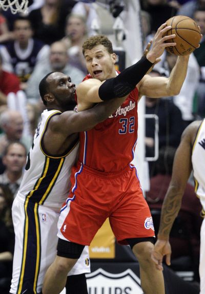 Utah Jazz center Al Jefferson defends against Los Angeles Clippers forward Blake Griffin (32) in the third quarter. (Associated Press)