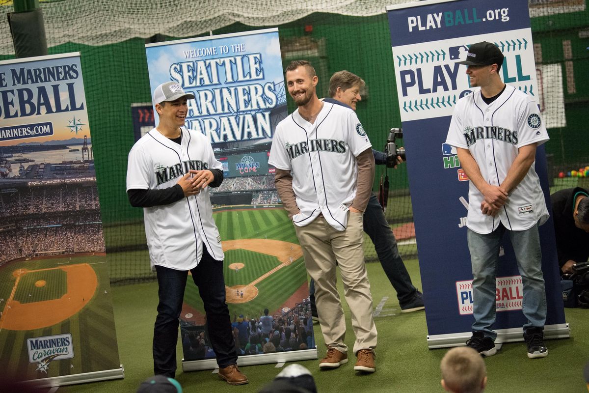 Gonzaga grad and Mariners pitcher Marco Gonzalez, left, laughs with teammates Shawn Armstrong, center, and Braden Bishop as they field questions from young fans during the Seattle Mariners Caravan
