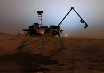 
An artist's rendering shows the Phoenix lander as it begins to shut down operations as winter sets in on Mars. The Phoenix is due to land on the Red Planet today. Associated Press
 (Associated Press / The Spokesman-Review)