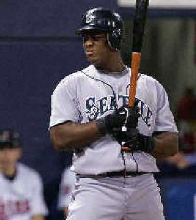 
Seattle's Adrian Beltre doesn't like the third-strike call he receives Friday.
 (Associated Press / The Spokesman-Review)