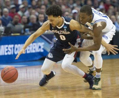 Gonzaga's Silas Melson battles Seton Hall's Isaiah Whitehead for the ball during the first half, March 17, 2016, at the Pepsi Center in Denver, Colo. (Dan Pelle/SR file photo)