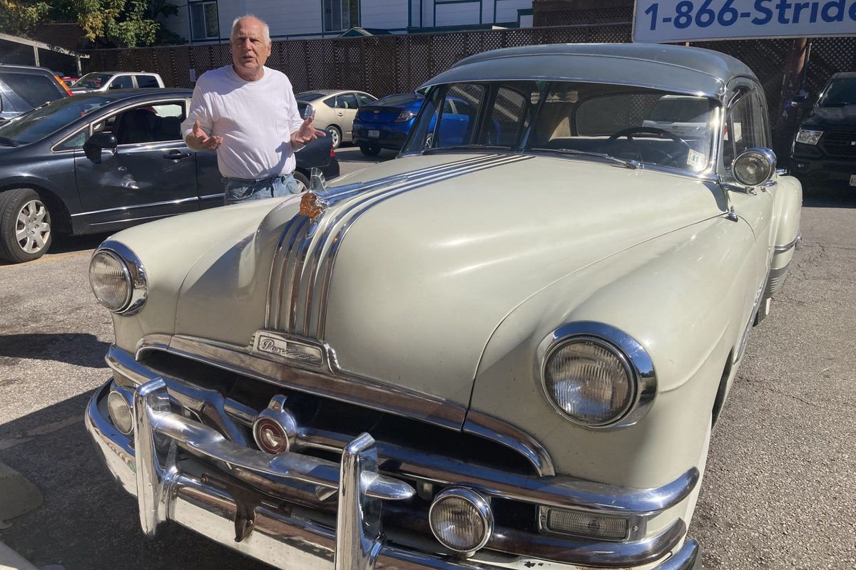 Jim Biddle and his classic Pontiac sedan.  (Laura Lane/Herald-Times)