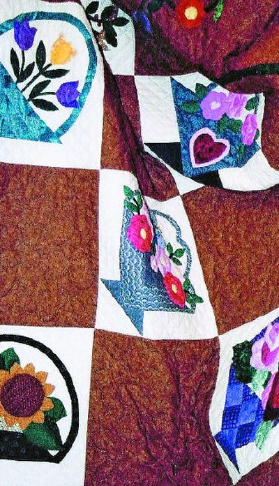
This Basket and Flowers quilt was made by the Coolin Cutups quilting group in Priest Lake, Idaho. 
 (Courtesy of Marylyn Cork / The Spokesman-Review)
