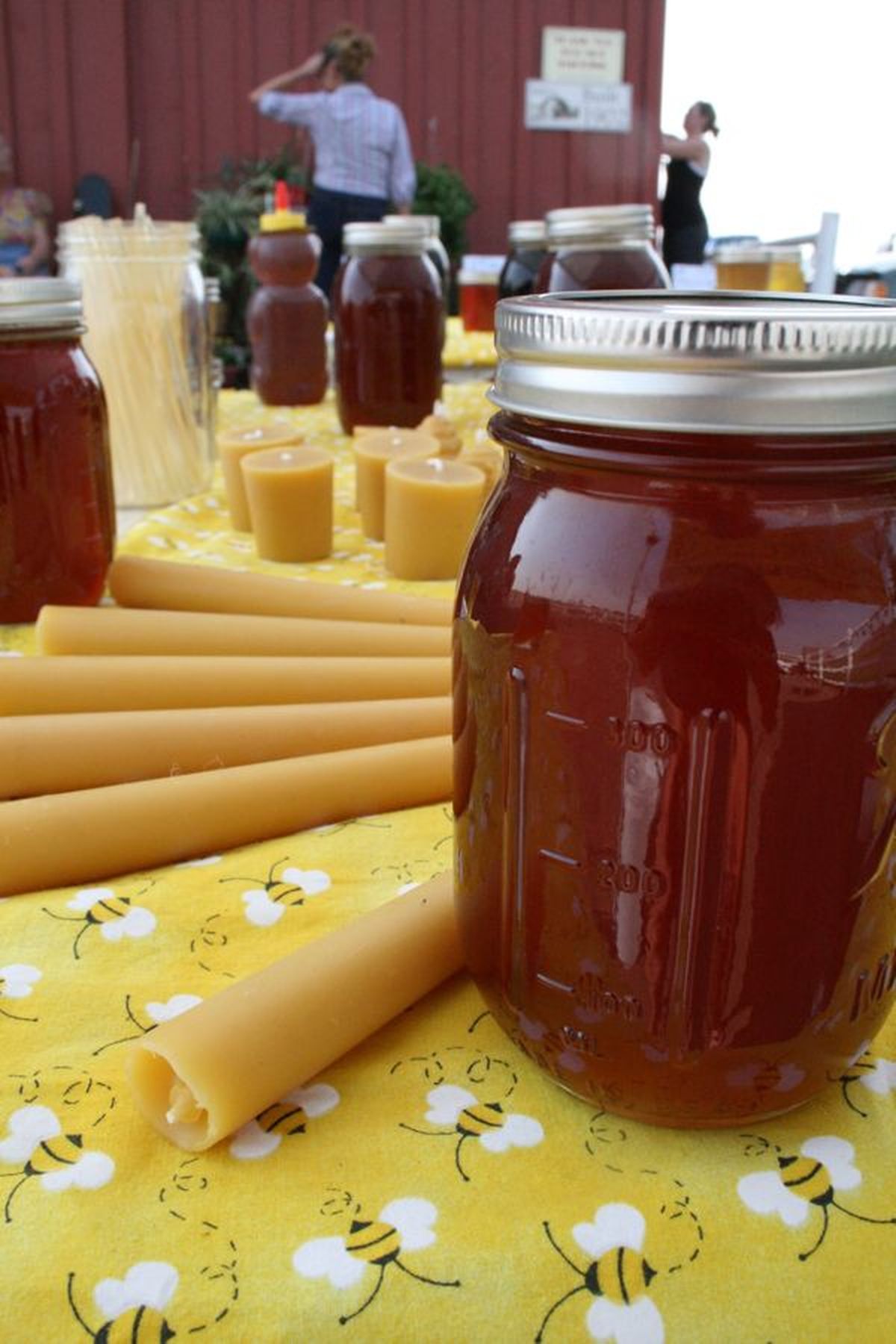 Products from Spokane-based Wild-n-Sweet Rich Honey are displayed at the Big Red Barn Farmers Market in Davenport on Friday, Aug. 6, 2010. The farmers market operates on Fridays from 4 to 8 p.m. (Megan Cooley)