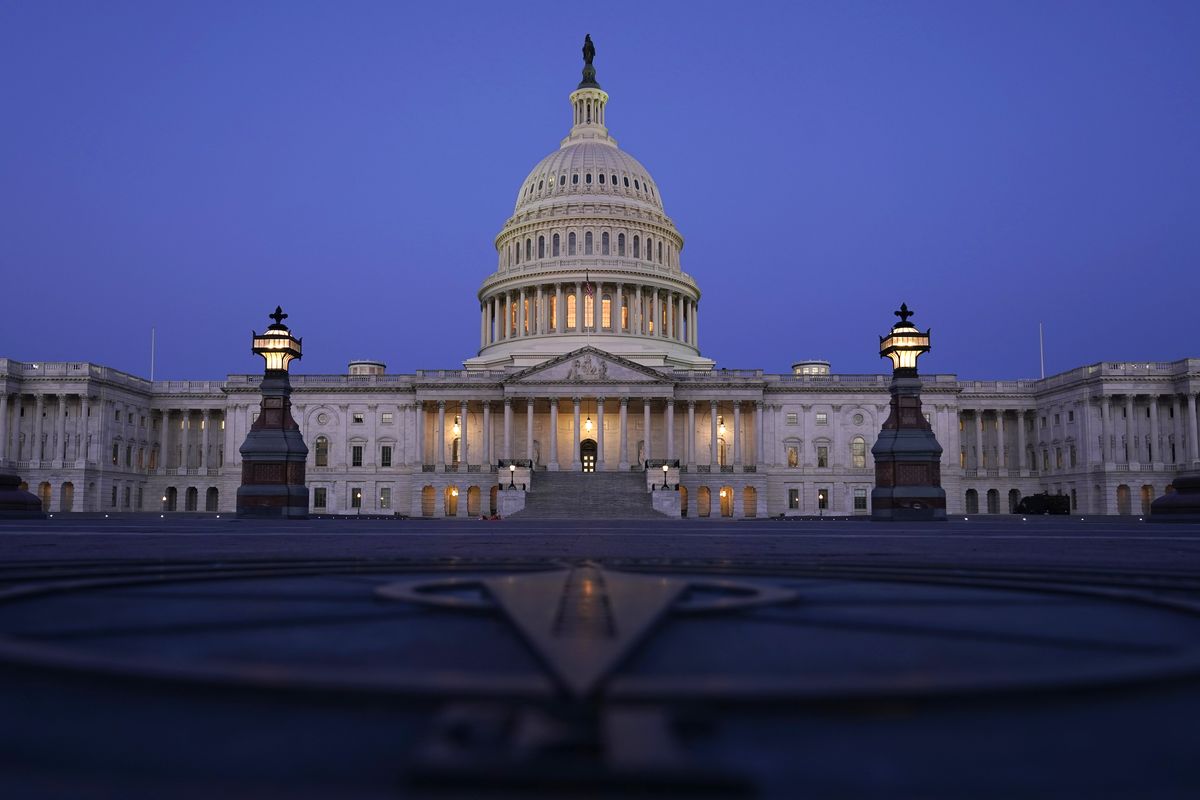 The Capitol is seen just before sunrise in Washington, Friday, March 5, 2021.  (Carolyn Kaster)