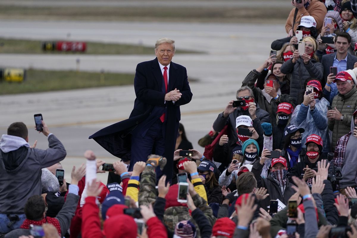 President Donald Trump arrives at a campaign rally, Saturday, Oct. 17, 2020, in Norton Shores, Mich.  (Carlos Osorio)