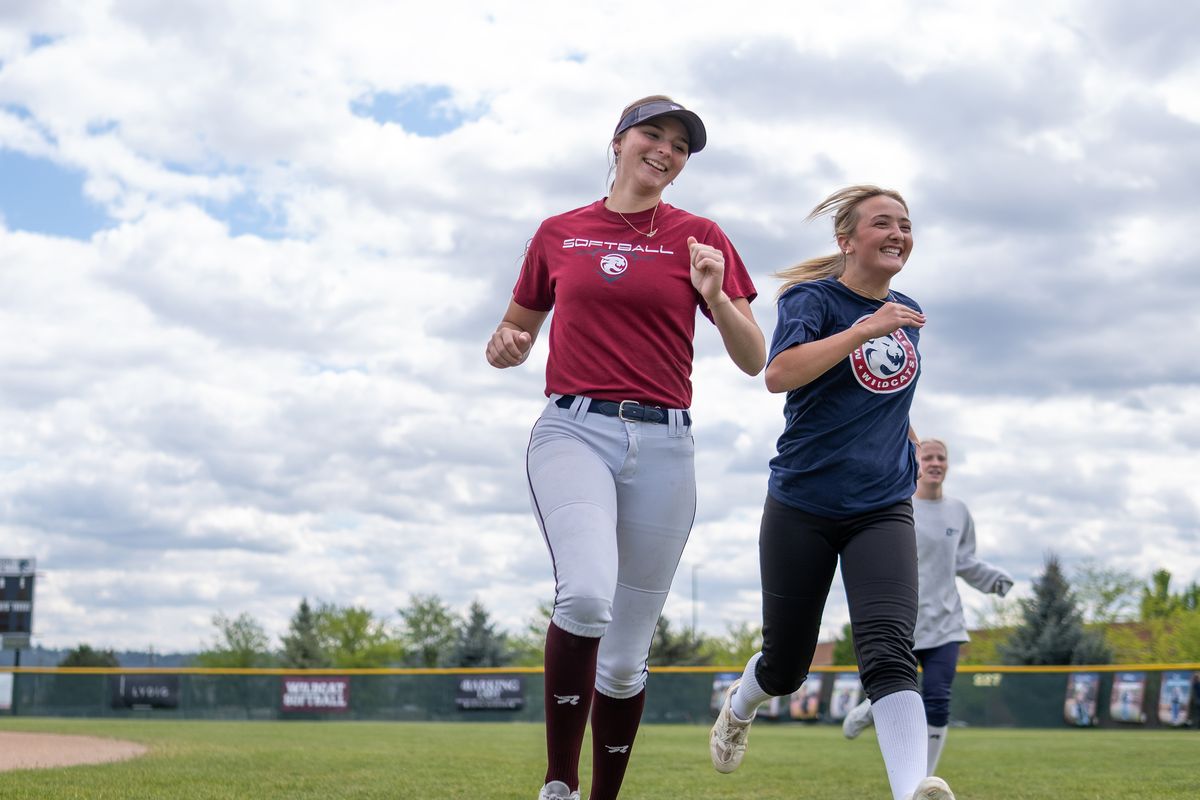 Mt. Spokane seniors Addison Jay, left, and Kaydin Bradeen finish their warmups ahead of practice on Tuesday at Mt. Spokane High School in Mead.  (Madison McCord/For The Spokesman-Review)