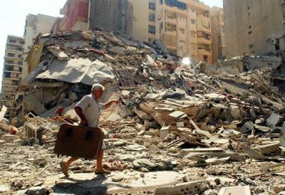 
On Thursday, a man walks on the rubble of an apartment building destroyed in an Israeli attack late Wednesday, in the Hezbollah stronghold of the southern suburbs of Beirut, Lebanon.
 (Associated Press / The Spokesman-Review)