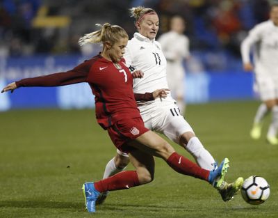 United States’ Abby Dahlkemper, left, tries to clear the ball away from Germany’s Alexandra Popp during the first half of a SheBelieves Cup women’s soccer match Thursday, March 1, 2018, in Columbus, Ohio. (Jay LaPrete / Associated Press)