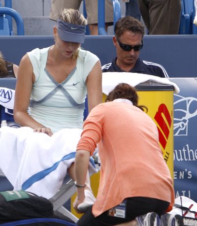 Maria Sharapova will miss the Rogers Cup in Montreal while recovering from a left foot injury sustained in Cincinnati.  (Associated Press)