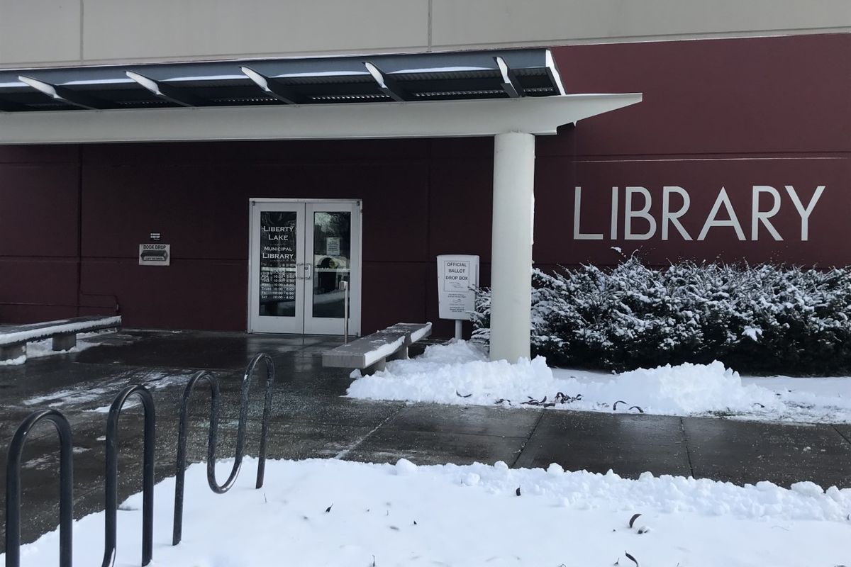 The Liberty Lake Library is seen on a snowy day in January 2020, before the shutdown to prevent the spread of COVID-19. The library has begun allowing 30-minute visits per person. Twenty visitors are allowed inside. The library awaits the new limits when the state moves into Phase 3 of Gov. Jay Inslee’s reopening plan.  (NINA CULVER/For The Spokesman-Review)