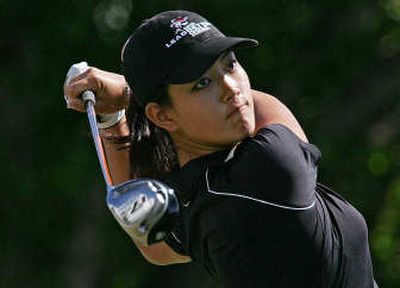 
Michelle Wie, who just finished her sophomore year in high school, has carved a unique path through women's golf.
 (Associated Press / The Spokesman-Review)