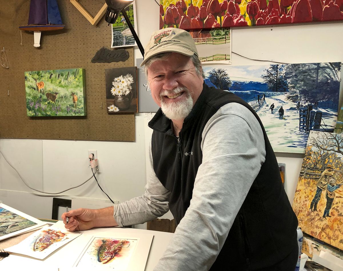Andy Sewell photographed at work in his studio in Viola, Idaho. Sewell, a University of Idaho graduate, has made a career of painting the Pacific Northwest. His work in currently on display at the Artisans at the Dahmen Barn in Uniontown, Wash. Above is his painting, “Freeze Church Winter.”  (Courtesy photo)