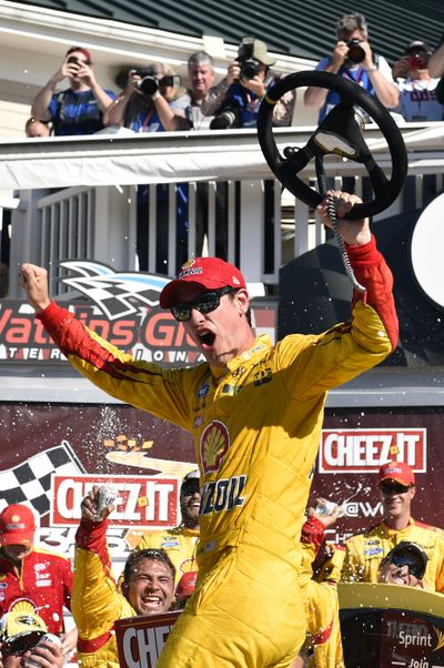 Joey Logano got first Sprint Cup win on a road course after victory at Watkins Glen. (Associated Press)