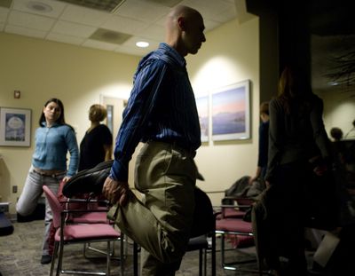 Will Frey leads a group of women in yoga stretching exercises during a University of North Carolina clinical study last month  in Raleigh, N.C. McClatchy Tribune (McClatchy Tribune / The Spokesman-Review)