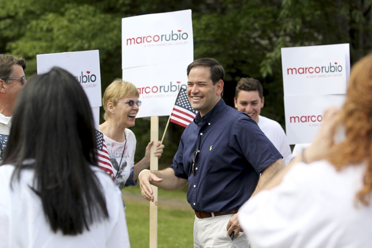 Republican presidential candidate Sen. Marco Rubio, R-Fla., smiles as he greets his supporters as he arrives to the staging area for the Fourth of July parade, Saturday, July 4, 2015, in Wolfeboro, N.H. (Mary Schwalm / Fr158029 Ap)