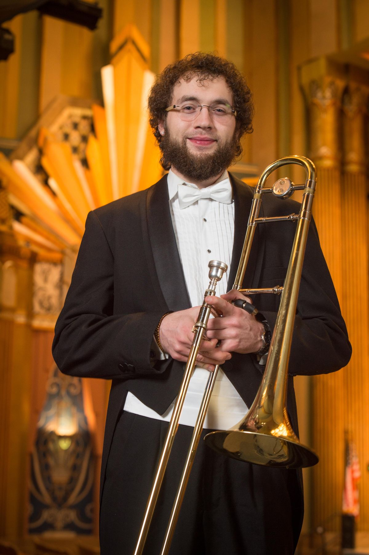 Spokane Symphony principal trombonist John Church grasps at every opportunity to break out of the “Masterworks” concert tuxedo and tails dress code. (Don Hamilton)