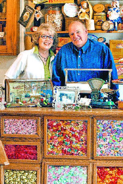 
Sharlene and Brian Scott show off the antique candy display at their American Country B&B  in Coeur d'Alene.
 (The Spokesman-Review)
