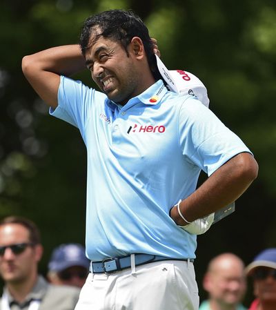 In this Aug. 2, 2018, file photo, Anirban Lahiri, from India, reacts after his tee shot on the 17th hole during the first round of the Bridgestone Invitational golf tournament at Firestone Country Club, in Akron, Ohio. The strength of field for the CIMB Classic was the same as it was last year, with one exception that Anirban Lahiri nearly found out the hard way. Lahiri had gone to Malaysia the previous five years and he noted that the field – which the top 60 players available from the FedEx Cup – had always gone below 100. Lahiri finished last year at No. 99 and figured there was nothing to worry about. And then there was. (David Dermer / Associated Press)