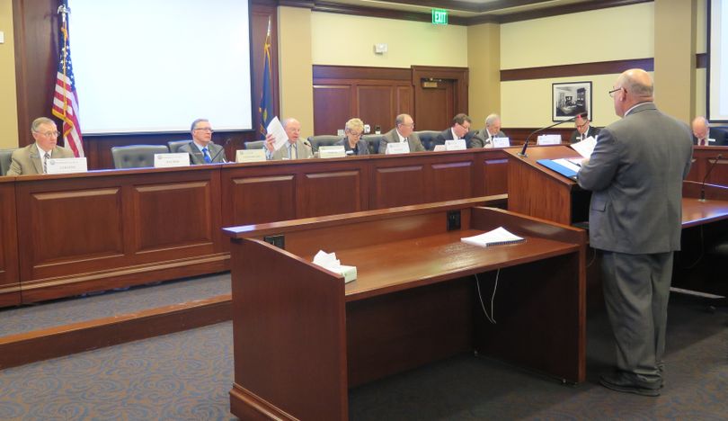 Idaho's chief state economist, Derek Santos, presents to the Legislature's joint Economic Outlook & Revenue Assessment Committee on Thursday, Jan. 18, 2018, at the Idaho state Capitol. (Betsy Z. Russell)