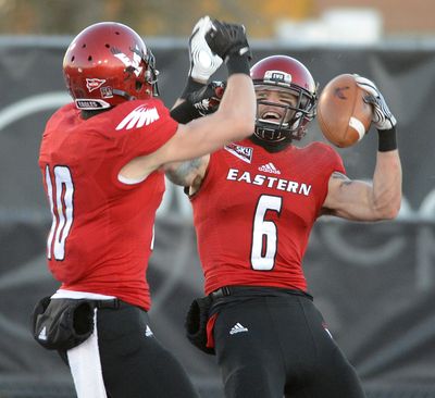 EWU wide receiver Cory Mitchell, right, celebrates a touchdown catch in last year’s playoffs with fellow receiver Cooper Kupp. (Colin Mulvany)
