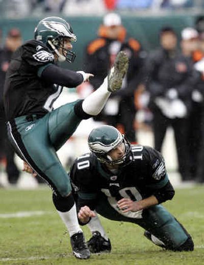 
 Not only can Philadelphia Eagles' kicker David Akers knockdown field goals, but he can also knockdown opposing players. 
 (Associated Press / The Spokesman-Review)