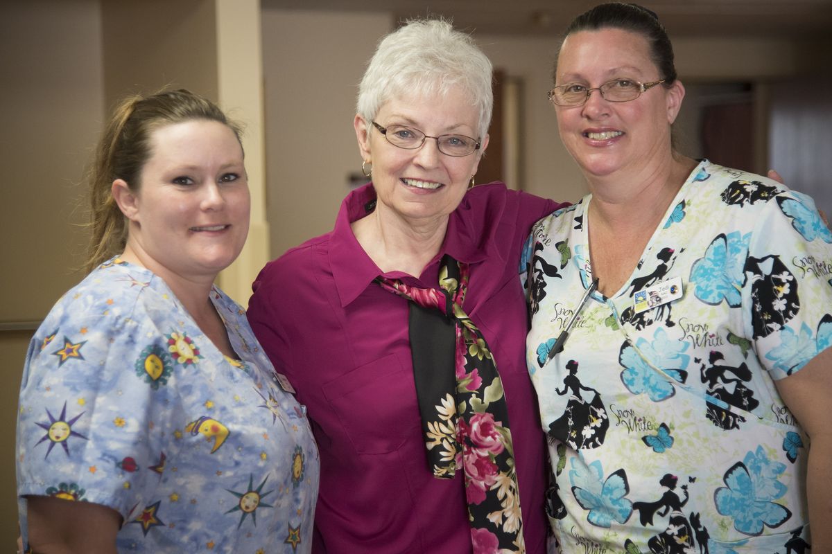 Former Sunshine Gardens patient Stevi Allen, center, still visits nursing assistants Summer Goodwin, left, and Jodie Morales, who helped her recover from a broken foot during a seven-week stay for rehabilitation. (Colin Mulvany)