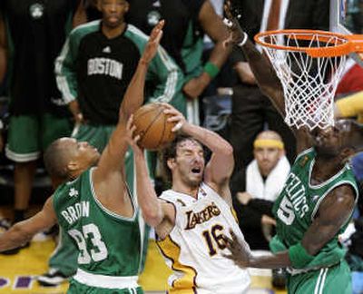 
Forward Pau Gasol, center, had a double-double on Sunday to help the Lakers extend the NBA championship series. Associated Press
 (Associated Press / The Spokesman-Review)