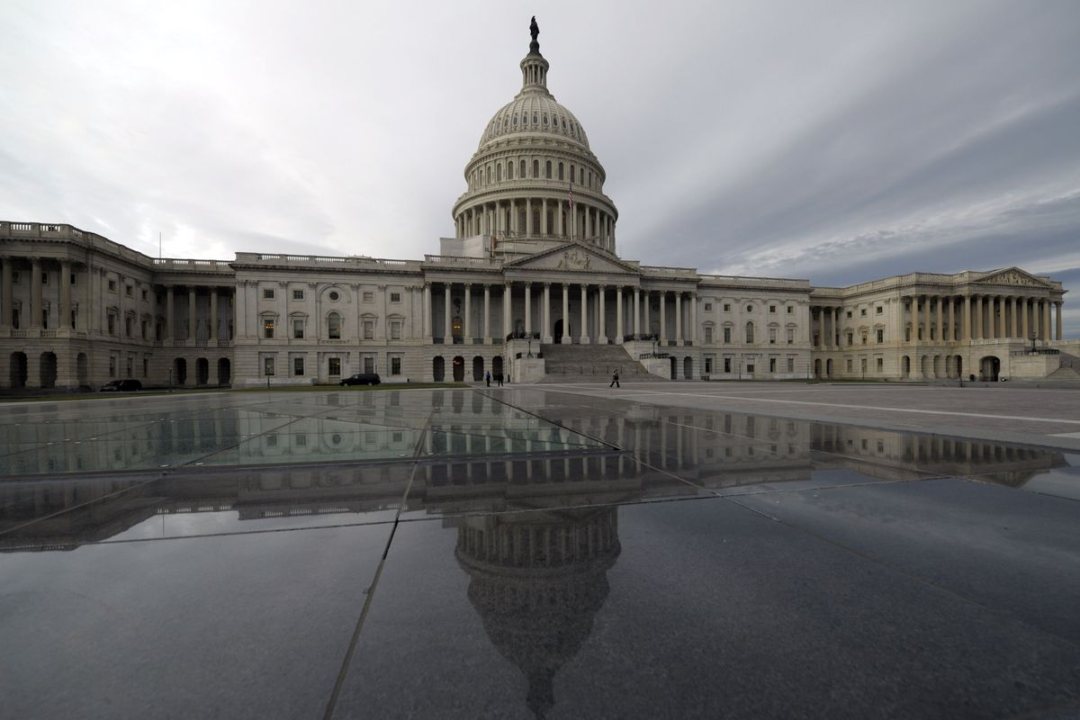 The U.S. Capitol in Washington is where Congress does its business. When determining representation for Congress in the nation’s early days, were slaves counted in states’ population figures? (Associated Press)