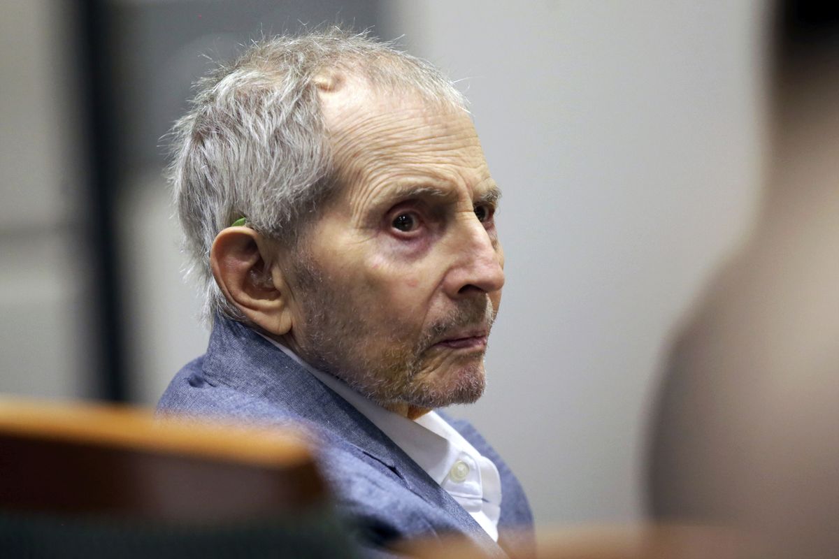 FILE - In this March 10, 2020, file photo, real estate heir Robert Durst looks over during his murder trial in Los Angeles. Fourteen months after the murder trial of New York real estate heir Durst was put on hold because of the coronavirus pandemic, jurors are returning to court to see if they can finish the assignment they were given. A Los Angeles judge will question jurors Monday, May 17, 2021, to find out if they can continue to serve in the case that is expected to last four to five months.  (Alex Gallardo)