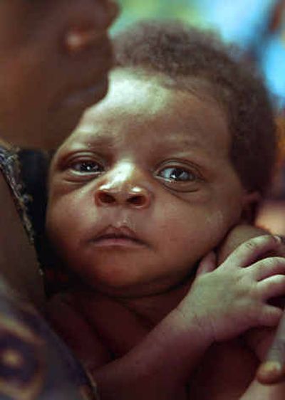 
A child is seen in the displacement camp of Tche on Saturday. 
 (Associated Press / The Spokesman-Review)