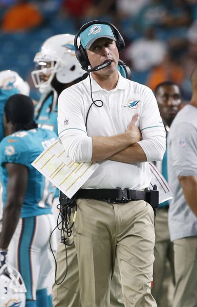 Adam Gase makes his NFL head coaching debut with the Miami Dolphins against the Seahawks on Sunday in Seattle. (Wilfredo Lee / Associated Press)