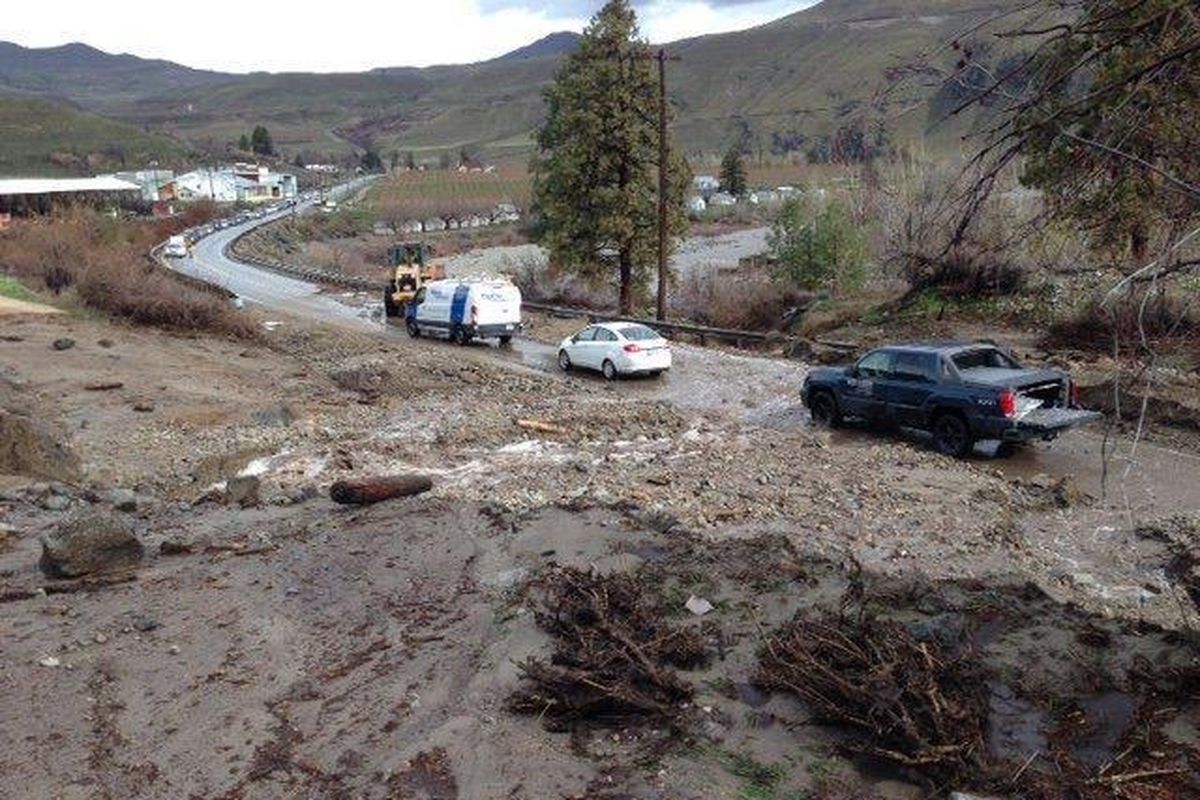 State Highway 153 just west of Pateros along the Methow River was partially blocked by a mudslide on Friday. (Washington state Dept. of Transportation)