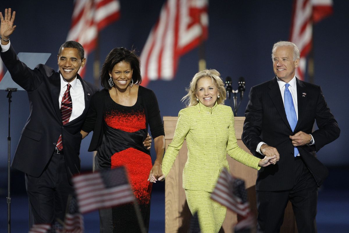 President-elect Barack Obama and his wife, Michelle, left, Vice President-elect Joe Biden and his wife, Jill, wave to the crowd after Obama’s acceptance speech in Chicago Tuesday night.  (Associated Press / The Spokesman-Review)