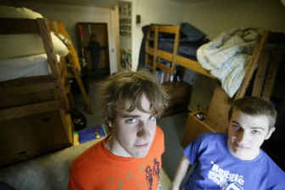 
Aaron Bennick, 19, left, a chemical engineering major, and Eric Romain, 20, a mechanical engineering major, are shown last week in their dorm room at the University of Michigan campus in Ann Arbor, Mich. They each get $100 at the end of the semester for keeping their room clean. 
 (Associated Press / The Spokesman-Review)
