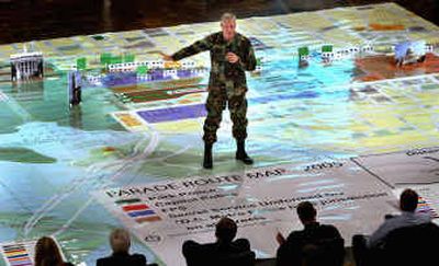
Maj. Gen. Galen B. Jackman of the Military District of Washington, stands on a giant map at the D.C. Armory in Washington on Dec. 16, during a preview of the parade route for President Bush's inauguration. 
 (File/Associated Press / The Spokesman-Review)
