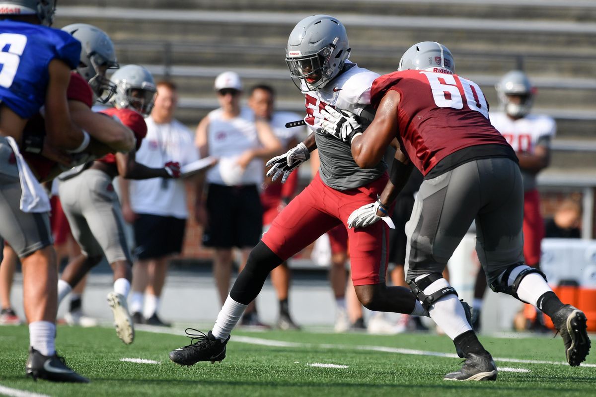 Willie Taylor III (57) runs to the Quarterback during practice on Thursday, August 16, 2018, in Pullman, Wash. (Tyler Tjomsland / The Spokesman-Review)